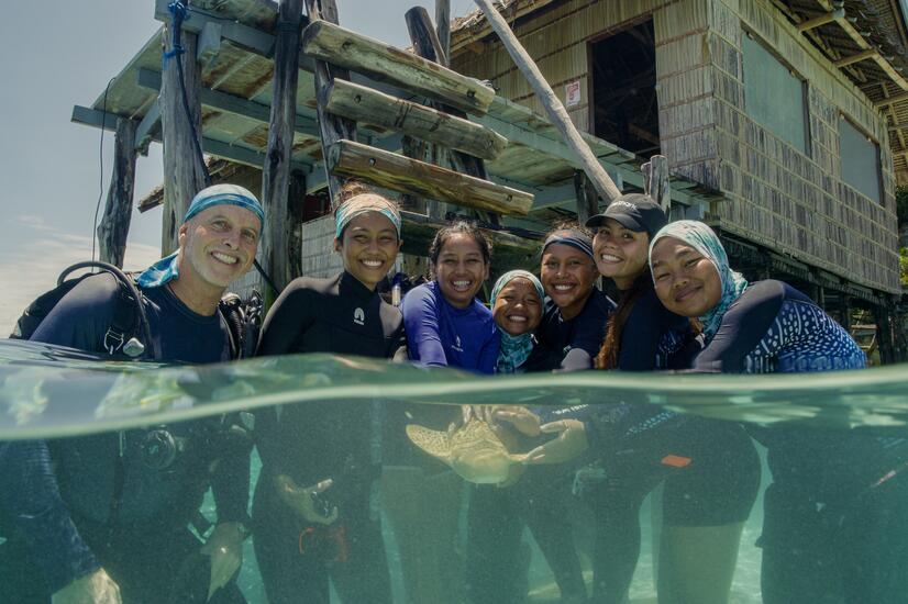 Shark nannies release a leopard shark pup. Photo by Luca Vaime.