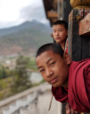 luxury travel Bhutan monks of Paro Bhutan happiness